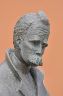 Monument to philosopher Friedrich Nietzsche, bronze sculpture, modern art, man with beard, head,