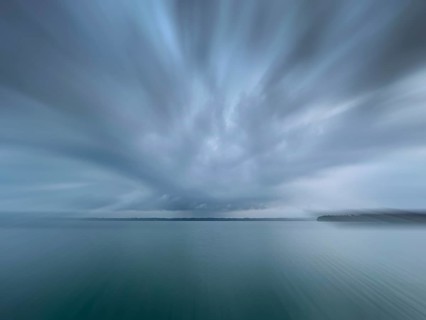 Dark clouds over Lake Starnberg, zoom effect, Bavaria, Germany