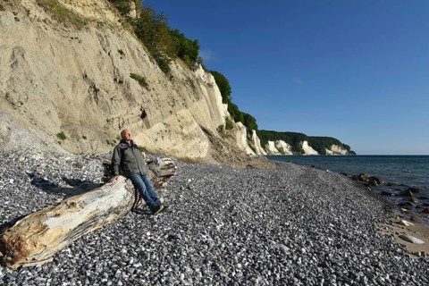 Hiker taking a break on the chalk coast of Rügen, Mecklenburg-Western Pomerania, Germany