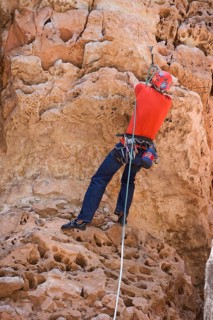 Man rock climbing at The Pit in Sandy's Canyon, Flagstaff, Arizona, USA
