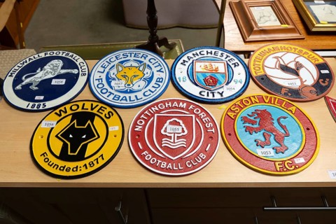 Metal replica football soccer club team crests or badges, Suffolk, England, UK