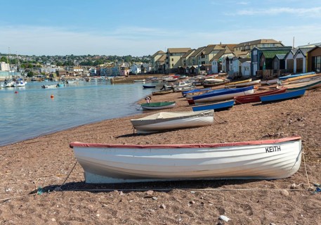 Small boats in harbour at Back Beach, Teignmouth, south Devon, England, UK