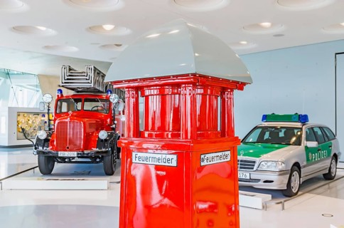 Gallery of helpers with rescue and police vehicles. The Mercedes-Benz Museum in Stuttgart presents