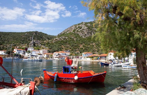 Red boat in the harbour of Agia Kiriaki on the Aegean Sea, Pelion or Pelion Peninsula, Magnisia,