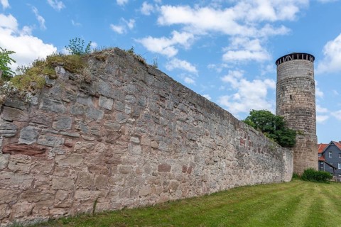 Medieval town wall with defence defence tower, Bad Sooden-Allendorf, Allendorf district, blue sky,