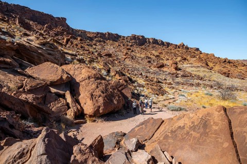 Tourists visiting the rock engravings of Twyfelfontein, Twyfelfontein, Kunene, Namibia