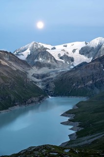 Mountain landscape with turquoise blue reservoir Lac des Dix and summit Mont Blanc de Cheilon,