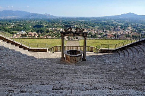 Fountain, draw well and flight of steps, rows of seats, auditorium, theatre of Roman antiquity at