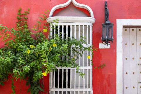 Colorful streets of Cartagena in historic Getsemani district near Walled City, Ciudad Amurallada