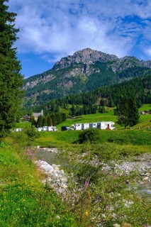 Motorhome site on the Piave, Sappada, Plodn, behind Monte Ferrro, Carnic Alps, Julian Friuli, Italy