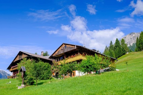 Old farmhouses in the hamlet of Kottern, Sappada, Plodn, Carnic Alps, Julian Friuli, Italy