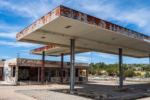 Ruins of a former gas station, now lost place, along road Ubeda-Baeza, Andalusia, Spain