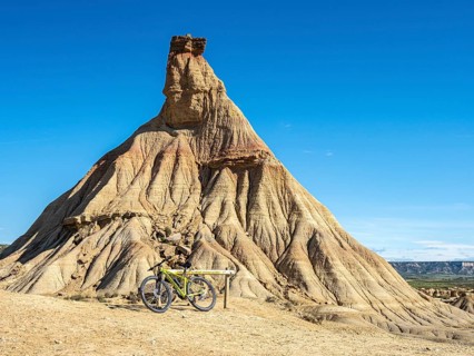Castildetierra rock formation, single bicycle, semi-desert, Bardena Blanca area, Bardenas Reales