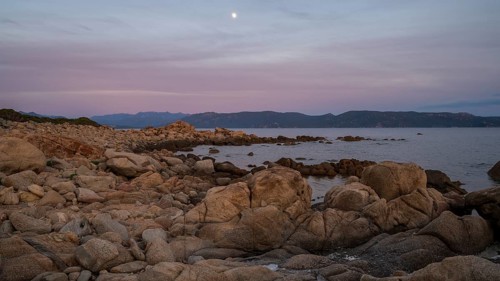 Sunset, rocky coast near Porto Pollo, Corsica, France