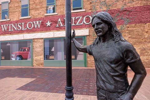 Statue of a man Standin' on a Corner in Winslow Arizona as sung in the classic Glenn Frey and