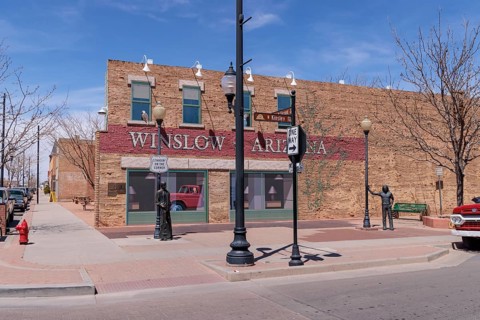 Statues of Glen Frey and a man Standin' on a Corner in Winslow Arizona as sung in the classic Glenn