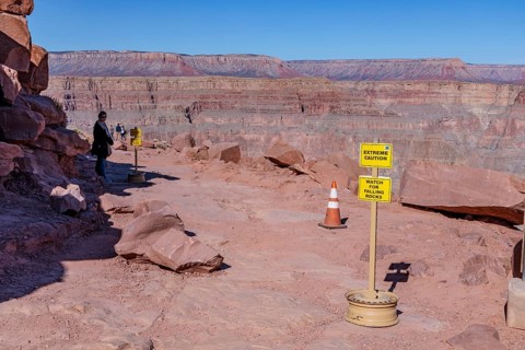 Sign warns of falling rocks at Guano Point area of Grand Canyon West near Peach Springs, Arizona