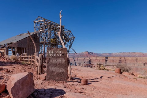 Sign at mining cable head-house tells history of bat guano mining at Guano Point in Grand Canyon