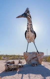 Giant Recycled Roadrunner statue made entirely from discarded materials by artist Olin Calk at an