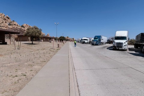 Truck driver headed back to his truck during a stop at the Texas Canyon Rest Area on i-10 West near