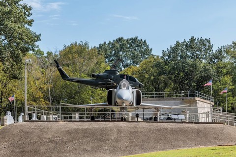 Captain Ed Yeilding's f4 Phantom aircraft and an Apache heilcopter on display at the Veterans