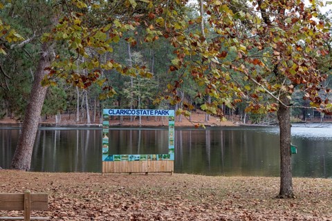 Permanent painte wooden photo prop beside Lake Ivy at Clarko State Park near Quitman, Mississippi,