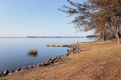 Small wooden dock and boat ramp on Lake Seminole at the Corps of Engineers Eastbank Campground near