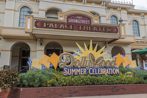 Groups of guests get photos taken in front of the Showstreet Palace Theater at the Dollywood