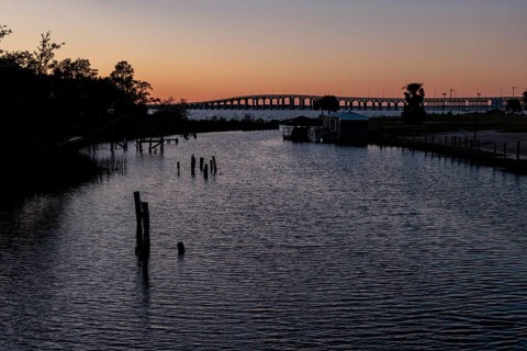 Bay St. Louis Bridge passes behind an inlet at Henderson Point in Pass Christian, Mississippi, USA
