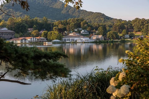 Private homes, Stuart Auditorium, and the Memorial Chapel across the lake at Lake Junaluska, North