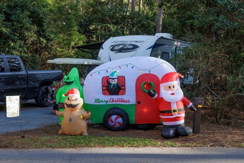 Inflatable Christmas and Halloween decorations at a campsite in Fort Wilderness campground at Walt