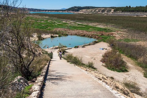 People take a bath, natural hot springs Banos de Zujar, near artificial lake Embalse de Negratin,