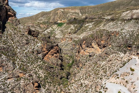 Hiking path Los Cahorros de Monachil, along the Rio Monachil river, narrow path in the river gorge,