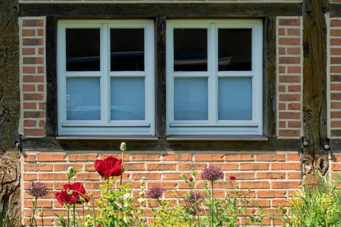 Half-timbered house façade with two small windows, district educational garden, Burgsteinfurt,