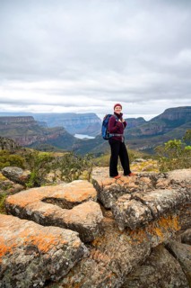 Tourist at Lowveld Viewpoint, view of the Blyde RIver gorge, canyon landscape, Blyde River Canyon,