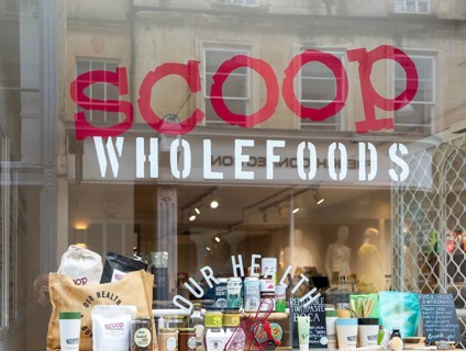Scoop Wholefoods shop store window, Green Street, city of Bath, north east Somerset, England, UK