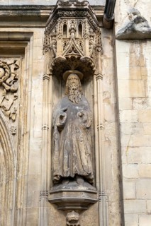 Carved stonework statue of Saint Paul, front of Abbey church, city of Bath, north east Somerset,
