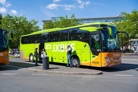 Flixbus, people standing in front, ZOB, Dortmund, Ruhr area, Westphalia, North Rhine-Westphalia,