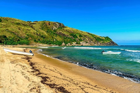 Speedboats in the sea at Bonete beach on Ilhabela island on the north coast of Sao Paulo, Ilhabela,