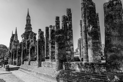 Historic Buddhist temple complex Wat Mahathat, historical park, black and white photo, Sukhothai,