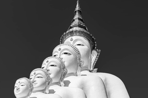 Five-headed Buddha statue, black and white photo, Wat Phra That Sorn Kaew Buddhist temple complex,