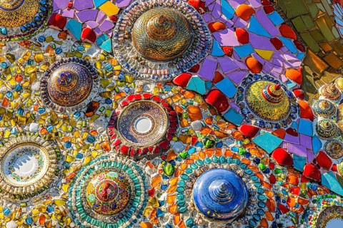 Wall covering with colorful mosaic tiles and incorporated bowls, Buddhist temple complex Wat Phra