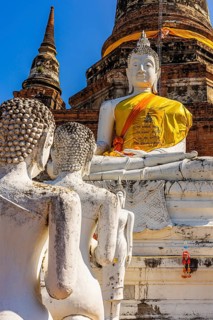 Stone Buddha statues, historic Buddhist temple complex, Ayutthaya, Thailand