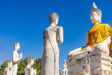 Stone Buddha statues, historic Buddhist temple complex, Ayutthaya, Thailand