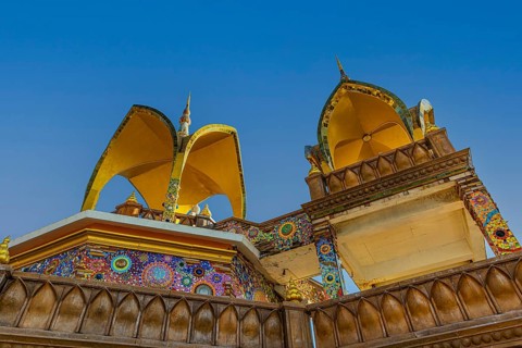 Round arch pavilions decorated with colorful mosaics and glass works of art, Buddhist temple