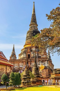 High temple tower, Prang, historic Buddhist temple complex, Ayutthaya, Thailand