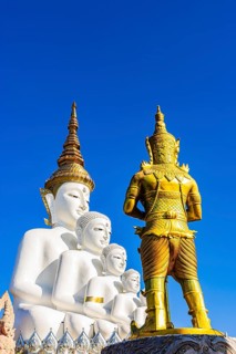 Five-headed Buddha statue with a gilded temple guard in front of it, Wat Phra That Sorn Kaew