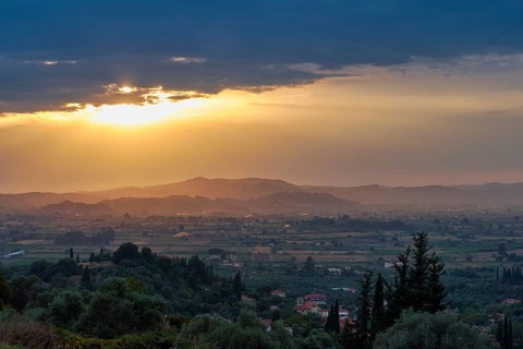 Panoramic view of a peaceful landscape at sunset with lush vegetation, Hotel Europa, garden