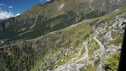 Winding roads wind in serpentines through steep, rocky mountains, trekking Ladakh, Himachal