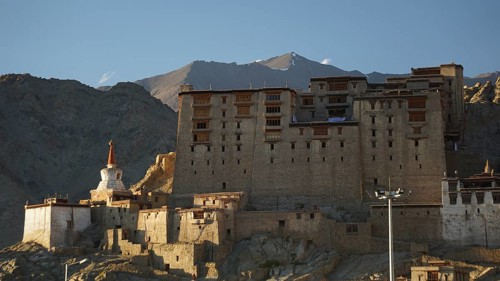 Leh Palace in mountainous landscape during twilight, Leh, trekking in Ladakh, Himalayas, India